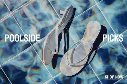  Two white sandals lie on sunlit blue pool tiles,casting shadows. Text reads 