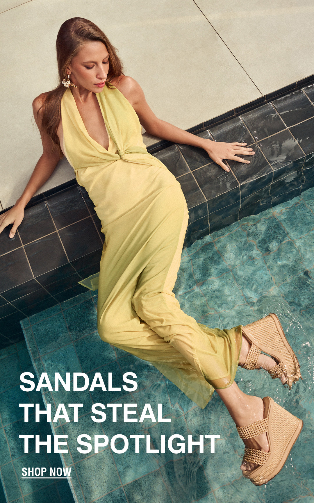 Woman in a yellow dress relaxes bya pool, wearing stylish tan sandals. Text reads "Sandals That Steal theSpotlight." Calm and elegant vibe. 