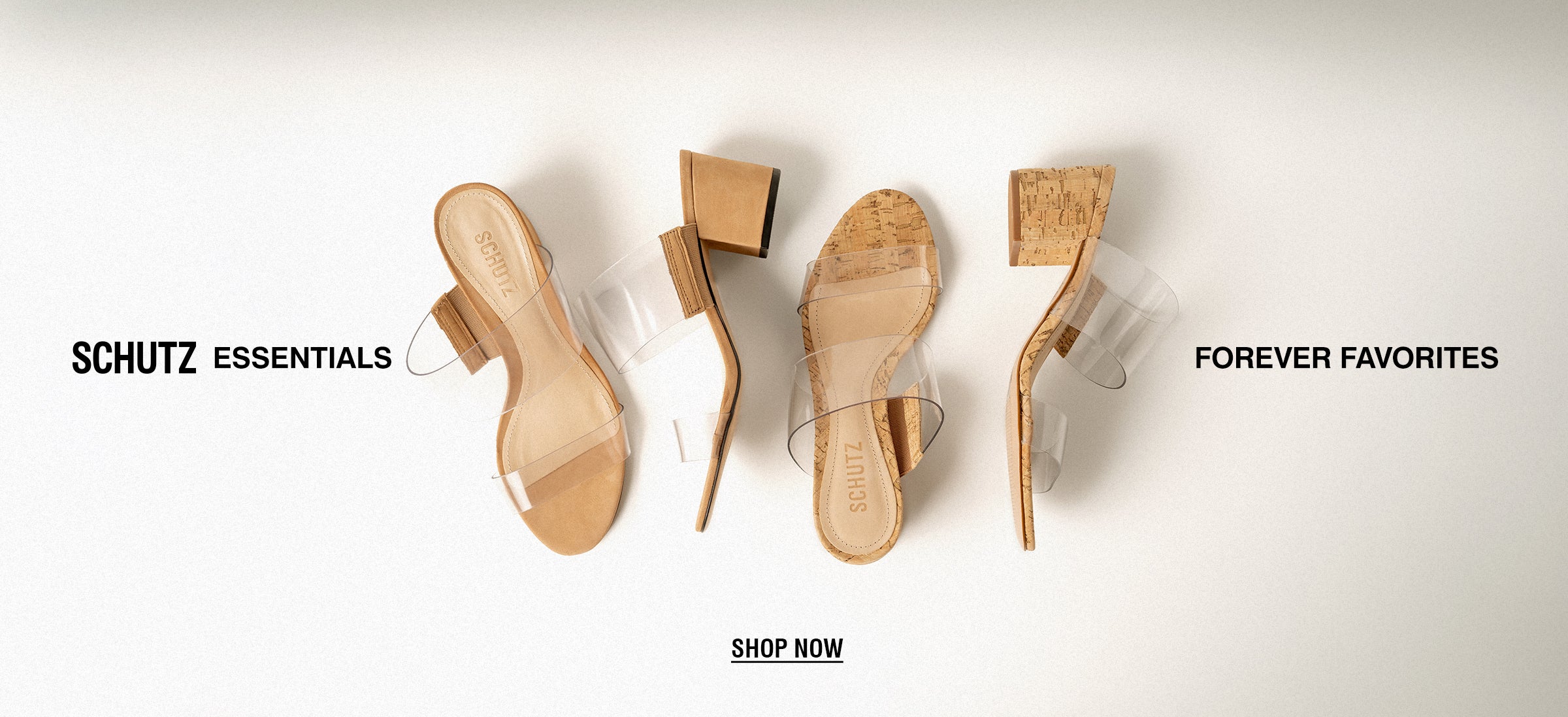 Three stylish, nude-colored sandals with clear straps are laid out diagonally on a light background. The text reads "Schutz Essentials: Forever Favorites. Shop Now."
