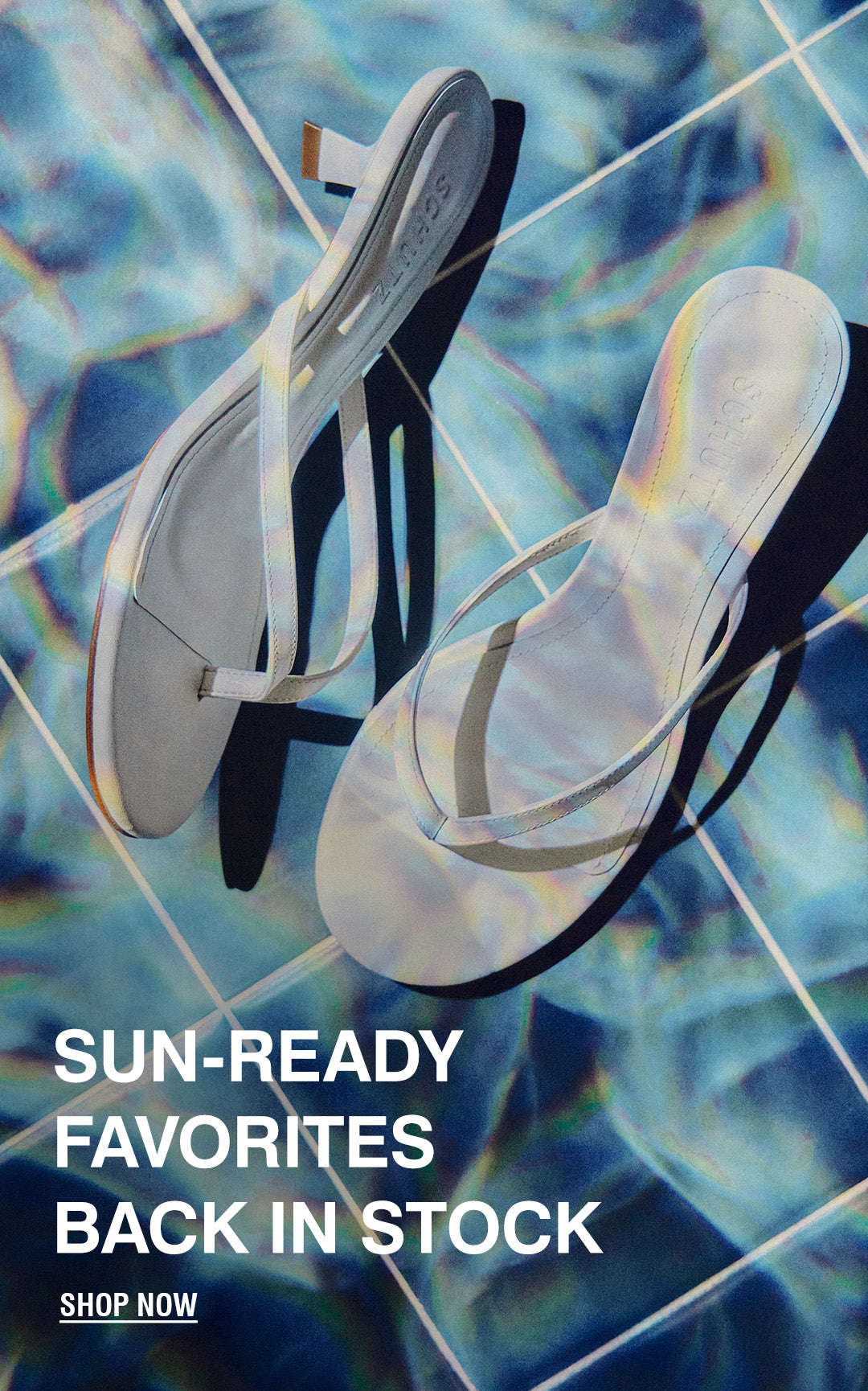White flip-flops on a sunlit, rippled blue pool surface. Text reads "Summer Favorites Back in Stock." A "Shop Now" button is at the bottom right.