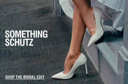 Elegant bridal-themed image featuring legs in white high heels on a metal staircase, with text 