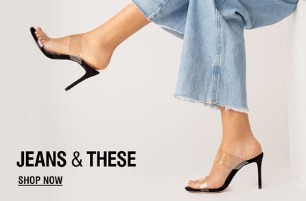 A leg in frayed blue jeans and a high-heeled sandal with clear straps extends against a white backdrop. Text reads 