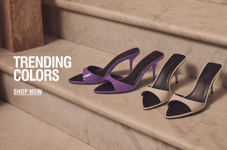 A vibrant display of trending colors in a retail setting, inviting customers to shop for the latest color trends. Text Reads: Trending Colors. Shop Now.