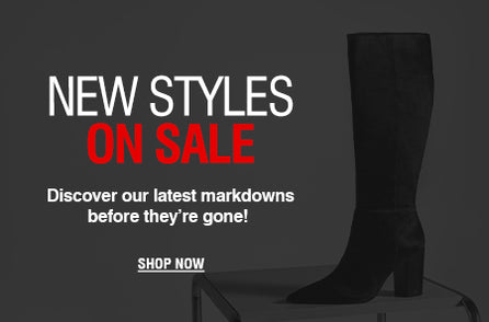 Black studded Mary Jane-style flats displayed on a textured surface, with the text 'FRESH FINDS ON SALE' in white and red, and a 'SHOP NOW' button on the left side.