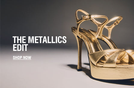 PLATFORM FEVER: Close-up of various platform sandals, including a prominent maroon patent leather sandal with a chunky block heel and thin ankle strap. Includes a 