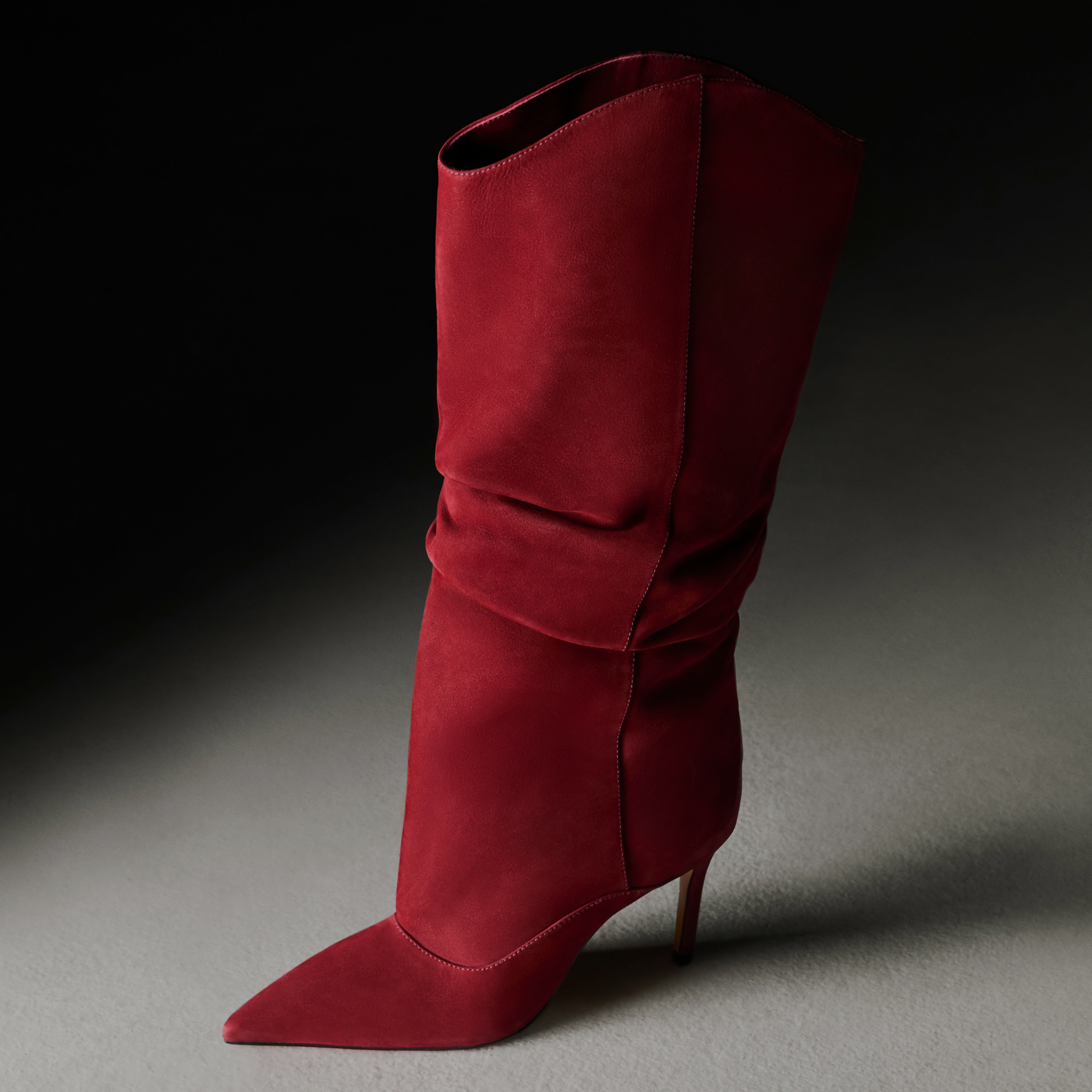 Red knee-high suede boot