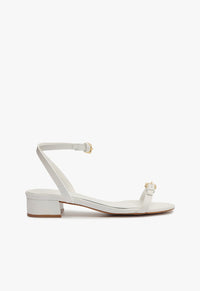 Go to related product Aurora Mid Block Leather Sandal