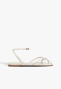 Go to related product Caeline Buckle Patent Sandal