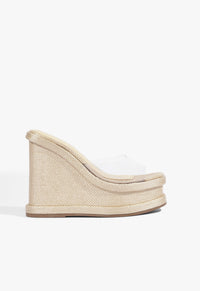 Go to related product Dalle Vinyl Wedge Sandal