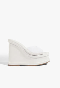Go to related product Dalle Vinyl Wedge Sandal