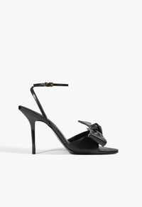 Go to related product Elodie Buckle Bow Leather Sandal