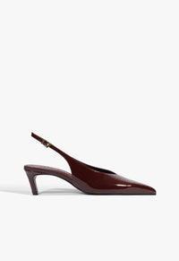 Go to related product Alicia Sling Mid Patent Pump