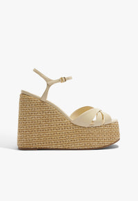 Go to related product Keefa Raffia Wedge Sandal
