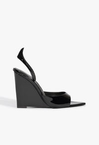 Go to related product Zya Patent Leather Sandal