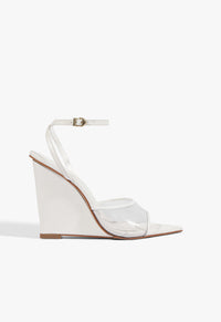 Go to related product Elodie Vinyl Wedge Sandal