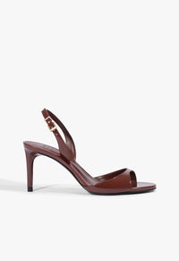 Go to related product Scarlett Sling Buckle Patent Sandal
