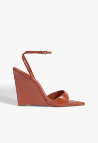 Go to related product Elodie Wedge Patent Sandal