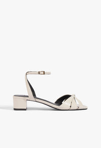 Go to related product Carmen Mid Leather Sandal
