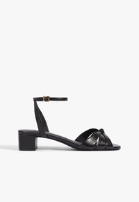 Go to related product Carmen Mid Leather Sandal